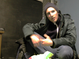 Justin Moyer becomes himself again as we talk in the basement of Northsix.